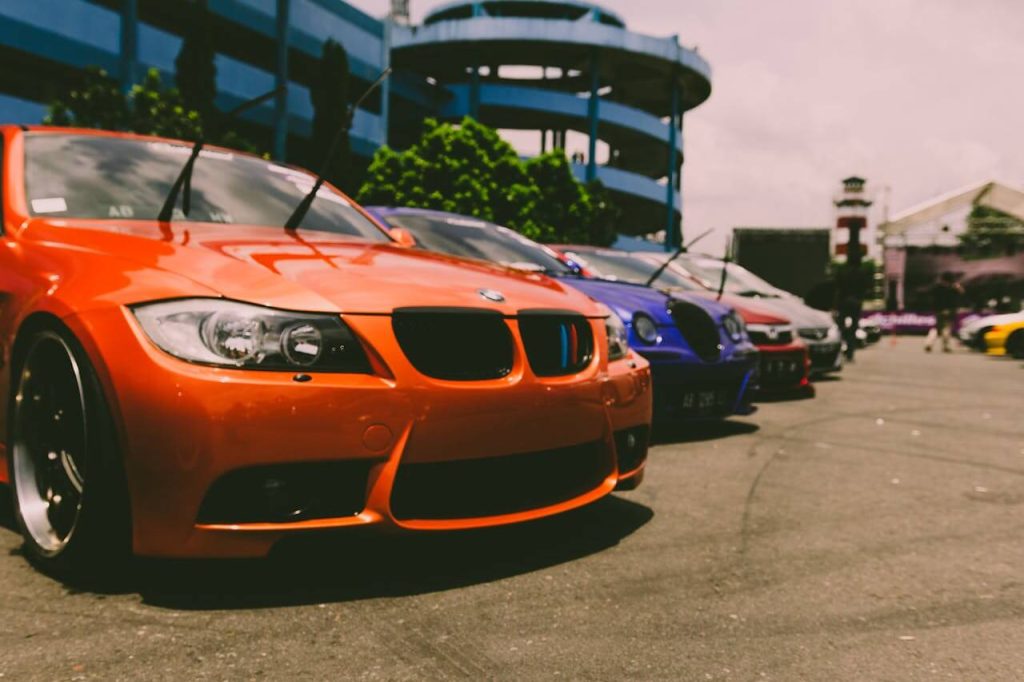 orange BMW M3 parked close-up